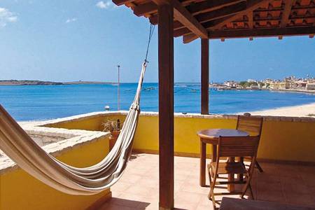 Orquidea Guesthouse, Terasse mit Hängematte und Meerblick